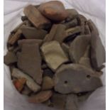 Roman and Medieval pottery shards, a large quantity in a bag. A good mixed lot with some glazed