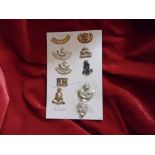 British Army Cap, Collar and Shoulder Title Badges (10) including: Staffordshire, Durham, Royal