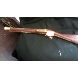 Muskatoon 1800's Replica Flintlock Rifle, an unusual weapon that was used similar to a Shotgun. Well