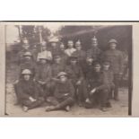 British WWI Royal Artillery group photograph showing the soldiers and their trophies, many wearing