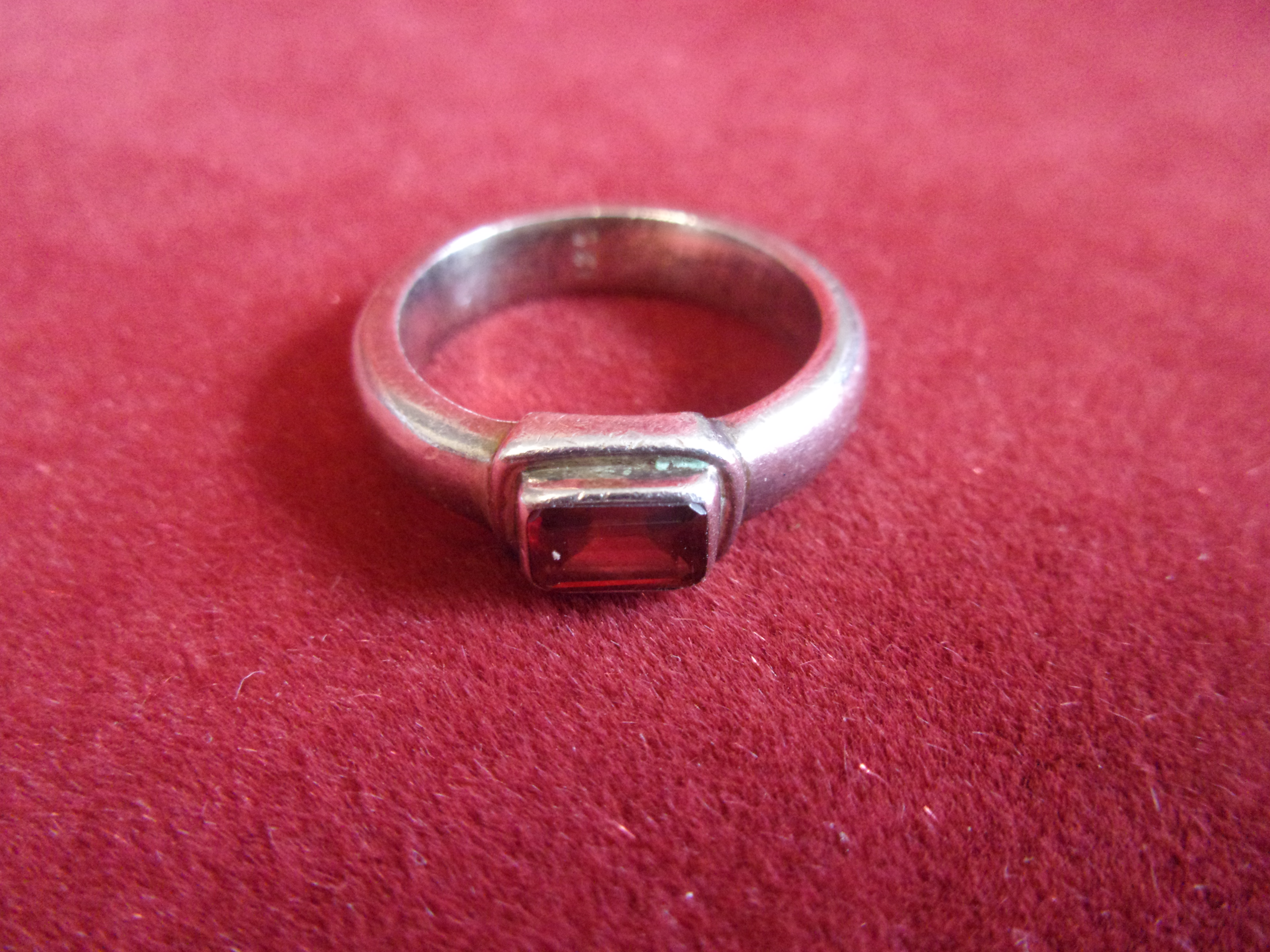 Silver Ring - Plain Bodied silver ring with rectangular red stone-ring size unknown