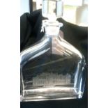 A heavy glass decanter by Orrfore, Limited edition No.100 engraved St Andrews scene of club house,