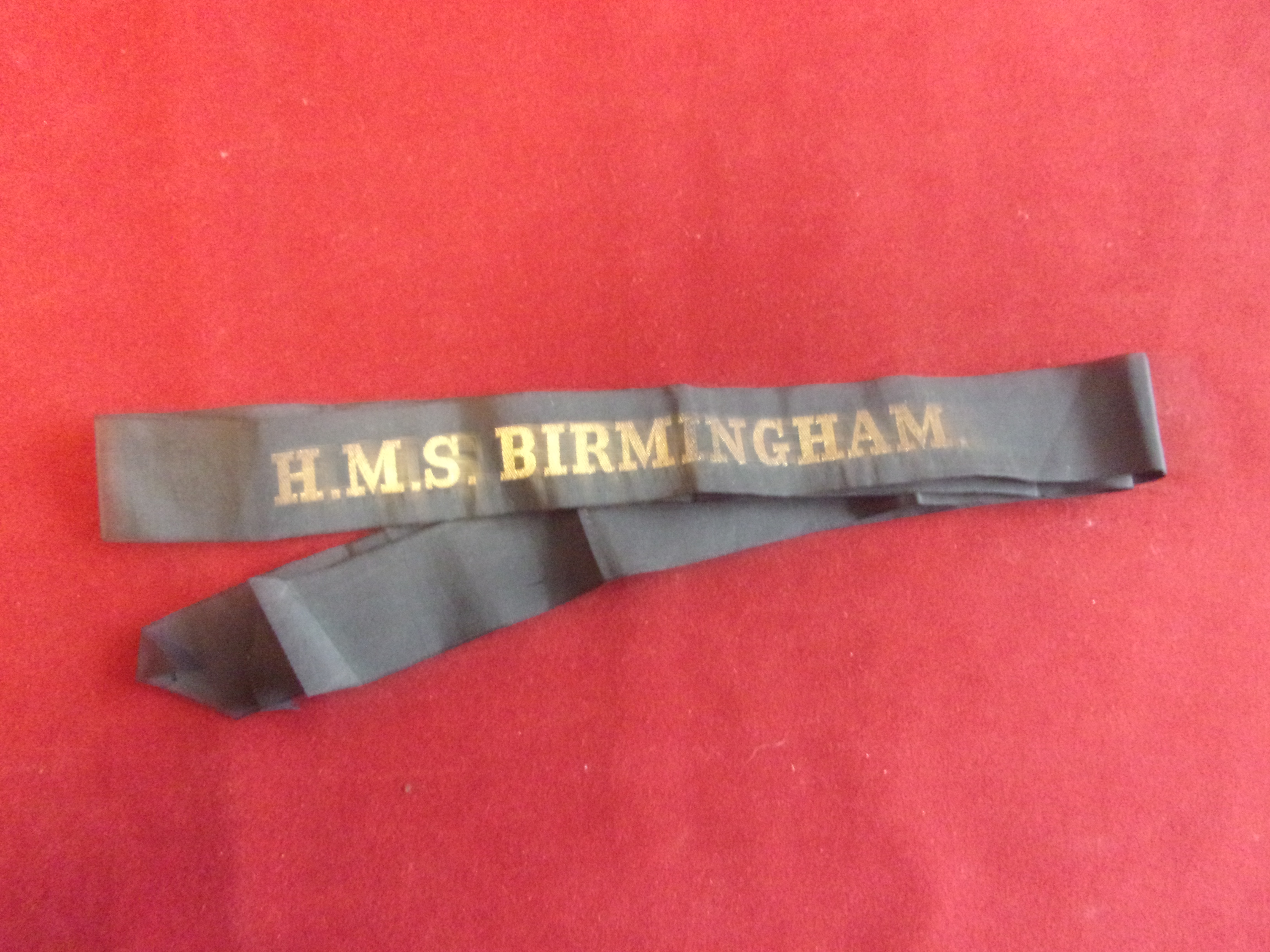 H.M.S. Birmingham WWII Royal Navy Cap Tally, H.M.S. Birmingham was a member of the first group of