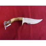 Vintage Hunting Knife, interesting collectable piece with the design of a wolf in the handle. No