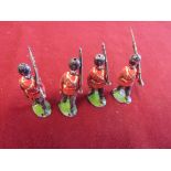 British Boer War Era Lead Soldiers (4) in scarlet uniform holding Lee Metford rifles. A nice