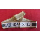 German WWII AfrikaKorps Cuff Title, excellent silver bullion stitch lettering upon an apple green