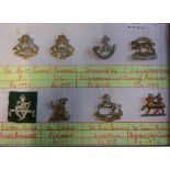 Beret Badges - Range of eight on a display board including: East Surrey Regt KC & QC K&K: 1195, Ox&