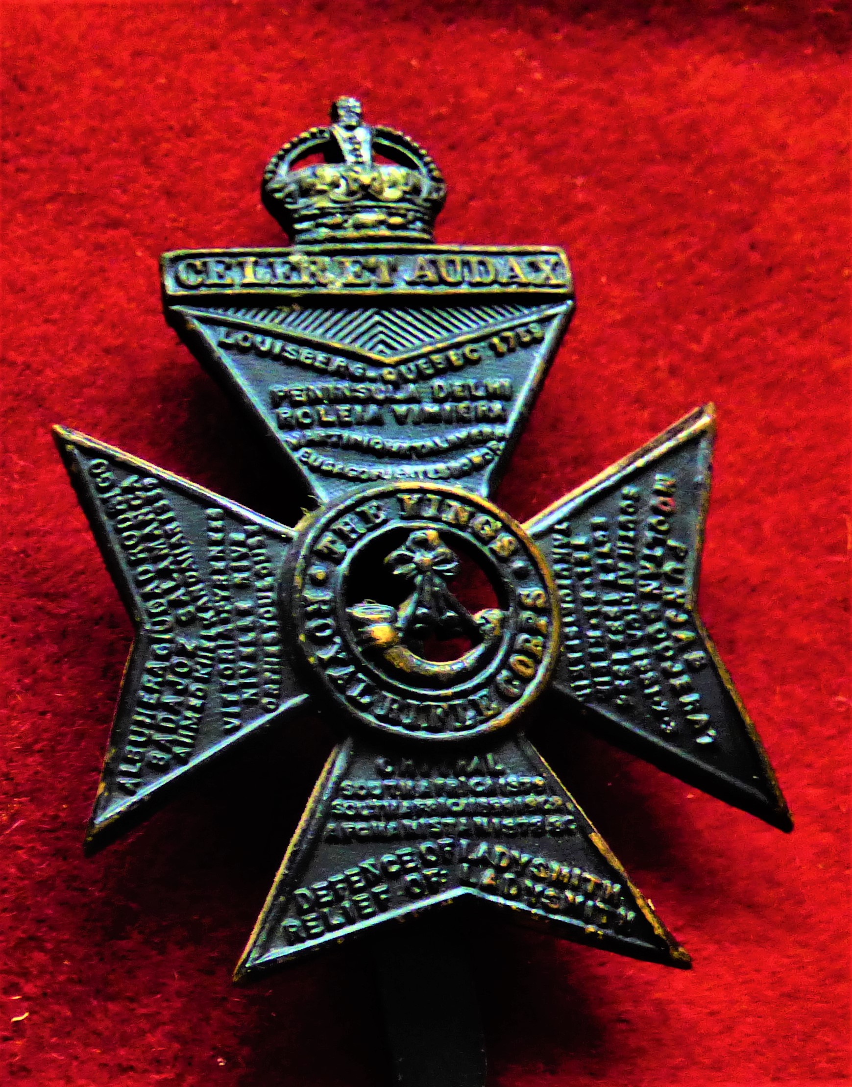 King's Royal Rifle Corps Forage WWI Cap Badge (Blackened-brass), slider, design sealed in . K&K: