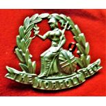 The Norfolk Regiment WWI Forage Cap Badge (White-metal), two lugs. K&K: 599