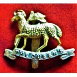 The Queen's (Royal West Surrey Regiment) WWI Cap Badge (Bi-metal), slider. K&K: 590