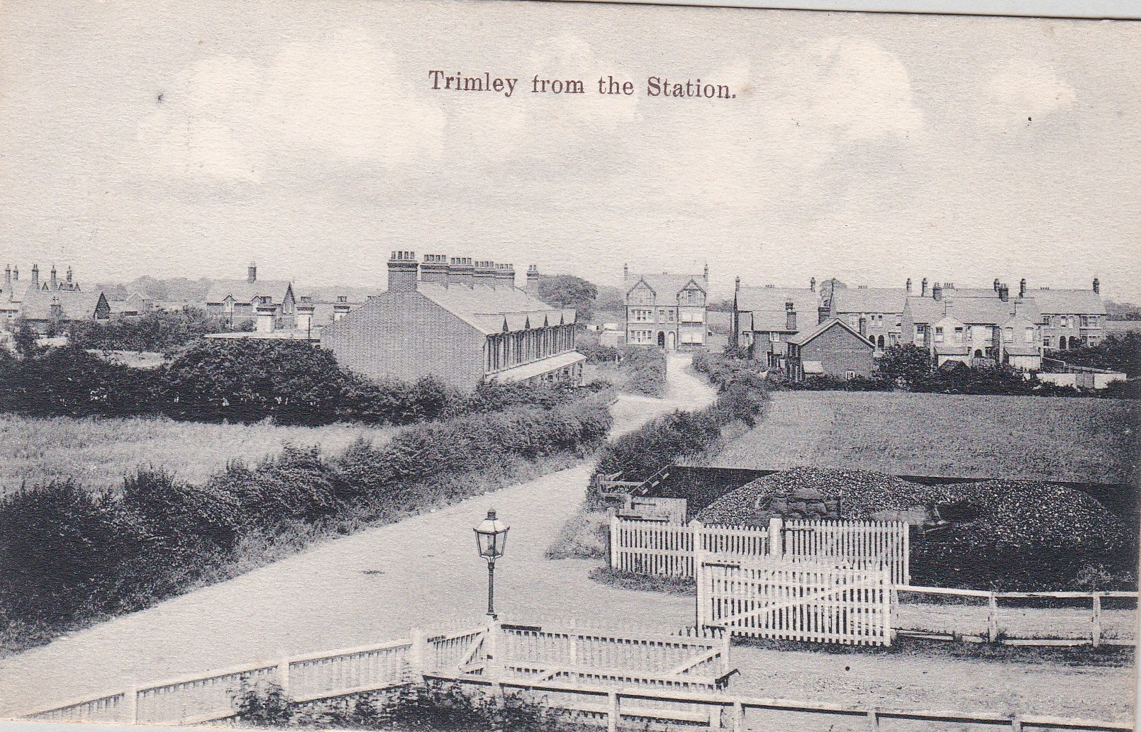 Postcards-Trimley black + white view ‘Trimley from the station’ unused