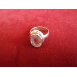 Silver Ring - Silver ring with a large white stone-ring size unknown