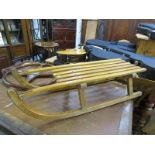 VINTAGE SLEDGE; A vintage beech framed sledge, 36"