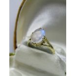 9 CT YELLOW GOLD MOONSTONE RING; Oval cabochon cut moonstone in multi claw setting, size O/P