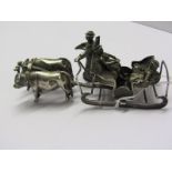 CONTINENTAL, White metal figure of oxon pulling sleigh