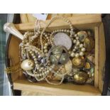 COSTUME JEWELLERY; A vintage jewellery box containing Celtic brooch, rings, military buttons,