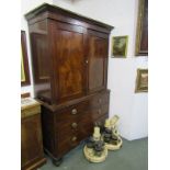 LATE GEORGIAN LINEN PRESS, twin figured mahogany panelled cupboard top with chest base of 2 short, 2