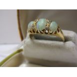 VINTAGE OPAL & DIAMOND RING, 3 graduated opals, each separated by 2 small accent diamonds, set in