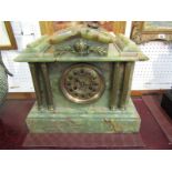 ONYX MANTEL CLOCK, a temple design green onyx and column support mantel clock, bell strike with