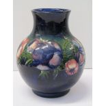 MOORCROFT, blue ground "Anemone" pattern 8" spherical vase