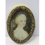 PORTRAIT MINIATURE in oval metal frame, "Portrait of Lady with blue ribbon in her hair"