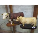 BESWICK CATTLE, plinth based Charolain Bull and Hereford Bull (restoration to leg)