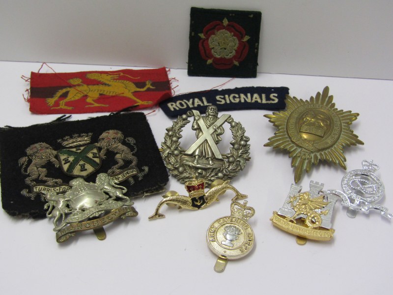 CAP & LAPEL BADGES, Manchester Regiment Coldstream Guards and other assorted badges