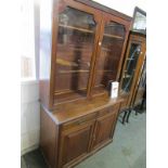 VICTORIAN BOOKCASE,, mahogany veneered with glazed doors above & 2 drawers & cupboards below