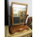 VICTORIAN DRESSING MIRROR, mahogany swing frame dressing mirror with serpentine fronted base