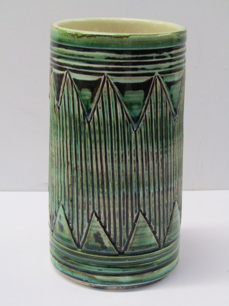 POOLE, green glaze cylindrical 9" vase decorated with ribbed geometric design