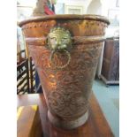 ANTIQUE METALWARE, a Continental design ornate embossed copper conical log basket with lion mask