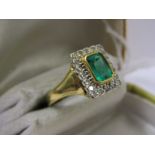 18ct YELLOW GOLD EMERALD & DIAMOND RING, central rectangular cut emerald of good colour and