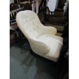 VICTORIAN NURSING CHAIR, cream button back nursing chair on tapering legs with original castors