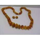 AMBER BEAD NECKLACE and clip on earrings untested amber bead single string necklace graduated size