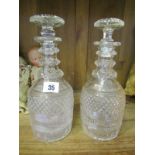 GEORGIAN GLASSWARE, pair of cut glass triple banded neck pineapple cut club decanters with