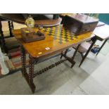 VICTORIAN GAMES TABLE; A Victorian mahogany veneered games table of rectangular form with chess