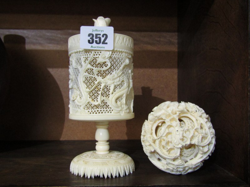 ANTIQUE IVORY, dragon carved multi sphere with reticulated lidded vase