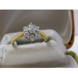 18ct YELLOW GOLD DIAMOND DAISY RING, 7 well matched brilliant cut diamonds totalling 0.50 carat,