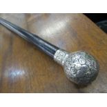 WALKING CANE, Indian silver capped ebony walking cane