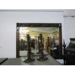 BEVELLED MIRROR, an ornate carved oak surround bevelled rectangular wall mirror, together with