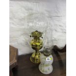 OIL LAMPS, splatter glass base oil lamp and brass pedestal oil lamp with clear glass shade