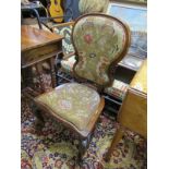 VICTORIAN SIDE CHAIR; A Victorian rosewood framed side chair on carved cabriole legs with floral