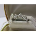 18ct WHITE GOLD 4 STONE DIAMOND RING an unusual handmade 4 stone diamond ring of approximately 1.6