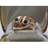 9ct ROSE GOLD DOUBLE HEADED SNAKE RING, each head set with garnet, HM Chester 1910, size S/T