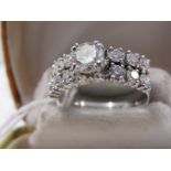 PLATINUM DIAMOND RING, of approx 2.8cts, central diamond 6.4mm, approx 1ct, set with 6 accent