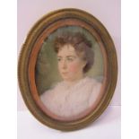 OVAL PORTRAIT MINIATURE, "Portrait of Young Lady in Lace Blouse" in brass oval frame