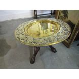 EASTERN METALWARE, ornate embossed brass circular tray top with folding stand, 30" dia