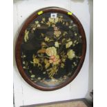 LATE GEORGIAN NEEDLEWORK, mahogany framed oval coloured silkwork panel, "Flowers and Bird", 17" x