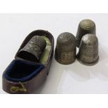 THIMBLES, a small collection of silver & white metal thimbles, three silver one including 1 by