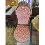 VICTORIAN NURSING CHAIR, floral carved top mahogany framed nursing chair